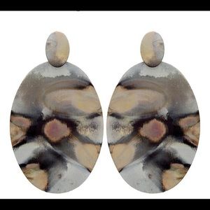 Sheila Fajl burnished silver earring .